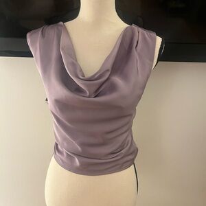 Hemline Hausen top, worn a couple of times. Has been to dry cleaners